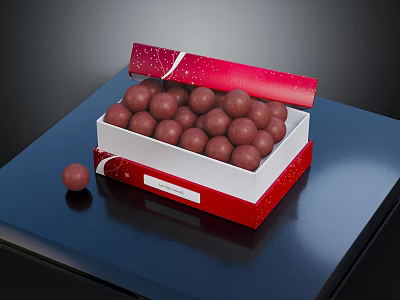 Red Decorative Open Box Filled With Chocolate Truffles On Dark Surface 3d model