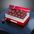 Red Decorative Open Box Filled With Chocolate Truffles On Dark Surface 3d model