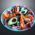 Fresh Avocado Halves With Prosciutto Slices Papaya Chunks And Fresh Herbs On Blue Plate