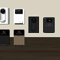 Various Modern Daily Electrical Appliances With Digital Displays And Different Colors