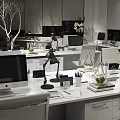 Modern Public Office Space With Long Table Hanging Lights Notebooks Pens And Green Plants