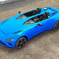 Blue Convertible Sports Car With Open Top Black Seats And Wheels