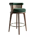 Bar Stools With Green Velvet Seats Woven Rattan Backrests Dark Wooden Legs And Metal Footrests