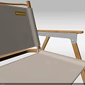 Two Folding Lounge Chairs With Wooden Frame And Light Fabric Seat In Minimalist Design