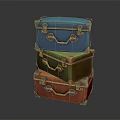 Vintage Colorful Trunks Stacked in Blue Green Orange Hues with Metal Accents
