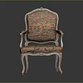 Elegant Ornate Single Chair With Floral Upholstery And Carved Wooden Details