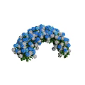 Arched Floral Arrangement With Blue And White Hydrangeas And Green Leaves Decor