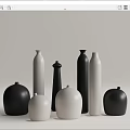 Elegant Black and White Ceramic Vases with Diverse Shapes and Modern Design