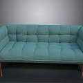 Stylish Teal Tufted Sofa With Wooden Legs And Modern Upholstered Design