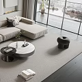 Modern Living Room Light Gray Sectional Sofa With Pillows Throw Blanket And Round Coffee Table