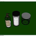 Modern Bathroom Accessories Featuring Pump Bottle Lidded Jars With Black White Lids And Gray Jar