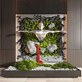 Silver Human Sculpture Indoor Landscape With Moss Wall Stones Red Stream And White Pebbles