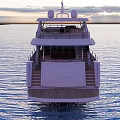 Luxury Yacht Sailing On Calm Sea At Sunset