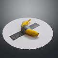 Yellow Banana Taped with Gray Tape Crossed on White Round Paper Against Gray Background