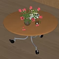 Round Wooden Tea Table With Metal Frame Wheels And Vase Red Roses Petals