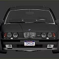 Blue BMW Sedan With Classic Design Silver Alloy Wheels And Shiny Surface On Dark Background