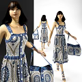 Elegant Model Wearing Blue And White Patterned Dress With Matching Handbag