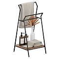 Black Metal Towel Stand with Wooden Shelf Bath Towels Soap Bottles and Dried Plant Vase