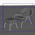 Modern Gray Upholstered Lounge Chair With Matching Ottoman In Minimalist Interior Space