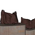 Fashionable Brown Leather Crossbody Bags Showcased On Sleek Metal Display Stands