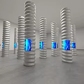 Art Installation Featuring Spiral Columns With Blue Illuminated Interiors In Gallery Space