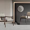 Minimalist Accent Chairs With Wooden Frames Cushions And Circular Wall Art
