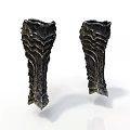 Pair of Medieval Black Leg Armor With Wavy Textured Patterns And Metallic Finish