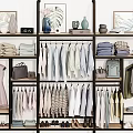Neatly Organized Closet With Hanging Folded Clothes Bags Shoes And Decorative Items