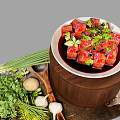 Braised Pork Cubes in Red Sauce with Scallions Coriander Mushrooms and Garlic on Wooden Table