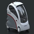Mitsubishi Heavy Industries Compact Autonomous Car With Transparent Cabin And Red Stripe Design