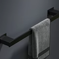 Modern Bathroom Accessories With Black Wall Mounted Towel Rack And Gray Towel
