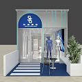 Modern Clothing Store Interior Featuring Bright Lighting Display Racks And Decorative Screens 3d model