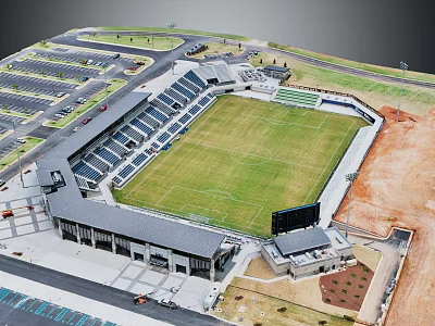 Aerial View Of Modern Football Stadium With Green Lawn Seating Stands And Parking Lots 3d model