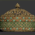Golden Decorative Container With Intricate Openwork Carvings Green Red Gemstone Inlays And Small Top Ornament