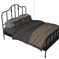 Stylish Black Metal Frame Double Bed With Striped Checkered Sheets Brown White Pillows And Beige Blanket