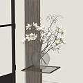 Clear Glass Vase With White Magnolia Flowers Arranged On Side Table Near Window