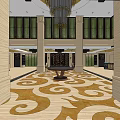 Elegant Hotel Lobby With Grand Chandelier Marble Columns And Ornate Patterned Carpet