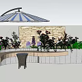 Outdoor Flower Planters and Flower Beds with Stone Wall Umbrella and Green Plants