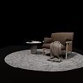Cozy Brown Single Sofa With Blanket On Round Woven Rug And Side Table 3d model