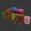 Wooden Clothes Hanger Setup With Ironing Board Stacked Towels And Wicker Basket Near Cabinet