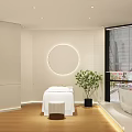Modern Beauty Salon Spa Interior With White Massage Table Round Mirror And Bathtub