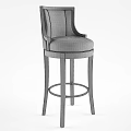Elegant Bar Stools With Gray Upholstered Seats Dark Wooden Legs And Gold Footrest Rings
