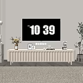 White Ribbed TV Stand with Vase Photo Frame Decorative Items and Green Plant Accent