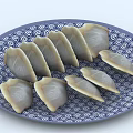 Traditional Chinese Dumplings Served on Blue and White Patterned Ceramic Plate 3d model