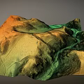 Colorful Topographic Landscape With Rolling Hills Green Valleys And Orange Yellow Ridges