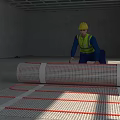 Worker in Yellow Hard Hat Laying Underfloor Heating Mesh in Interior Construction Site