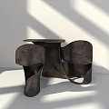 Modern Sculptural Table And Chair Set With Curved Shape And Dark Finish For Interior Decor