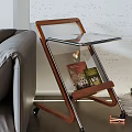 Wooden Frame Glass Top Side Table With Magazine Rack Next To Sofa