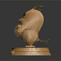 Golden Decorative Angry Chicken Figurine With Detailed Feathers On Shiny Base