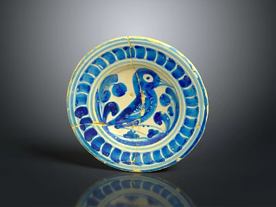 Antique Ceramic Plate Featuring Carved Bird Motif And Blue White Decorative Rim 3d model